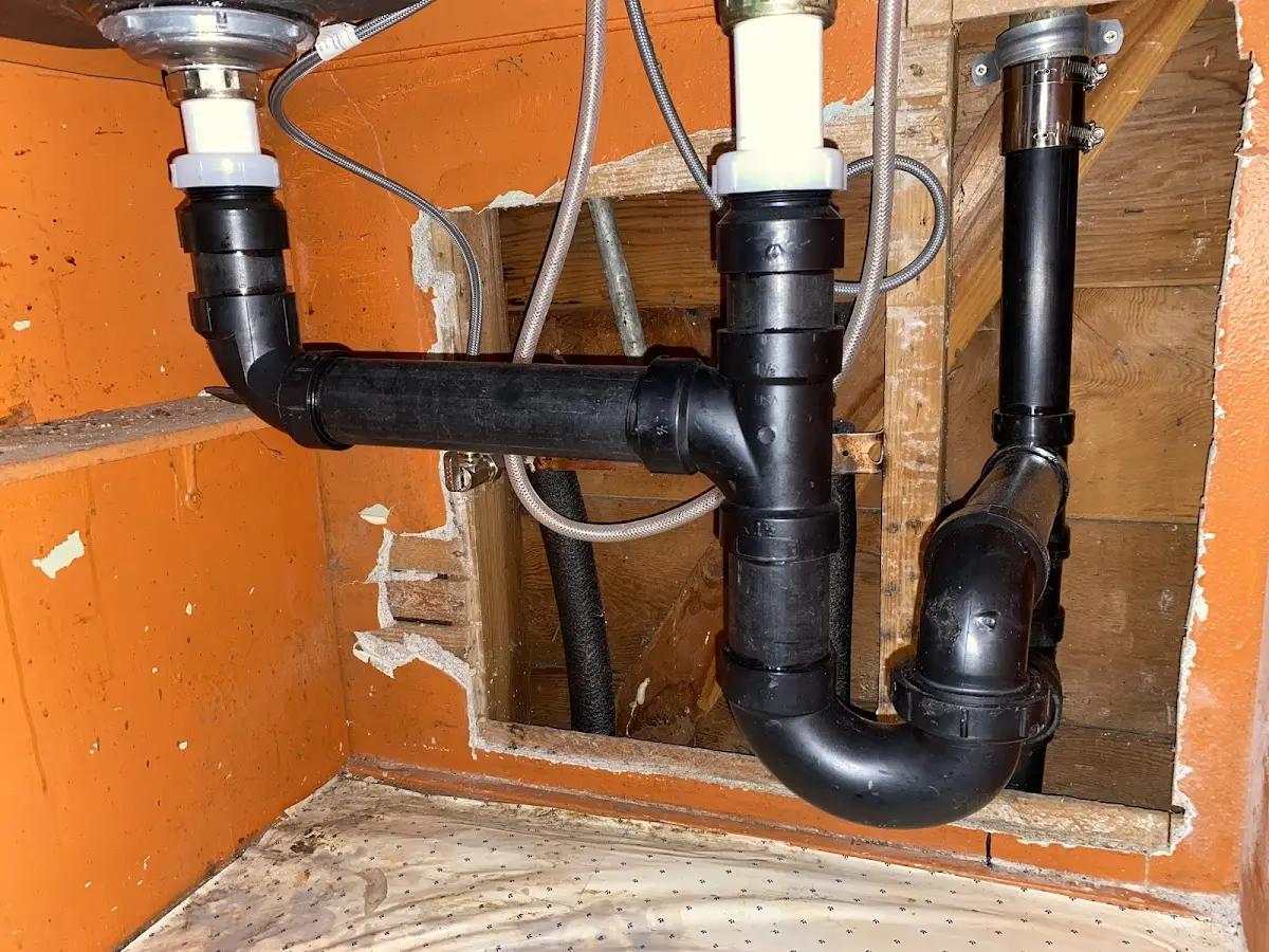 Professional Garbage Disposal Repair equipment and tools on the job in Salida